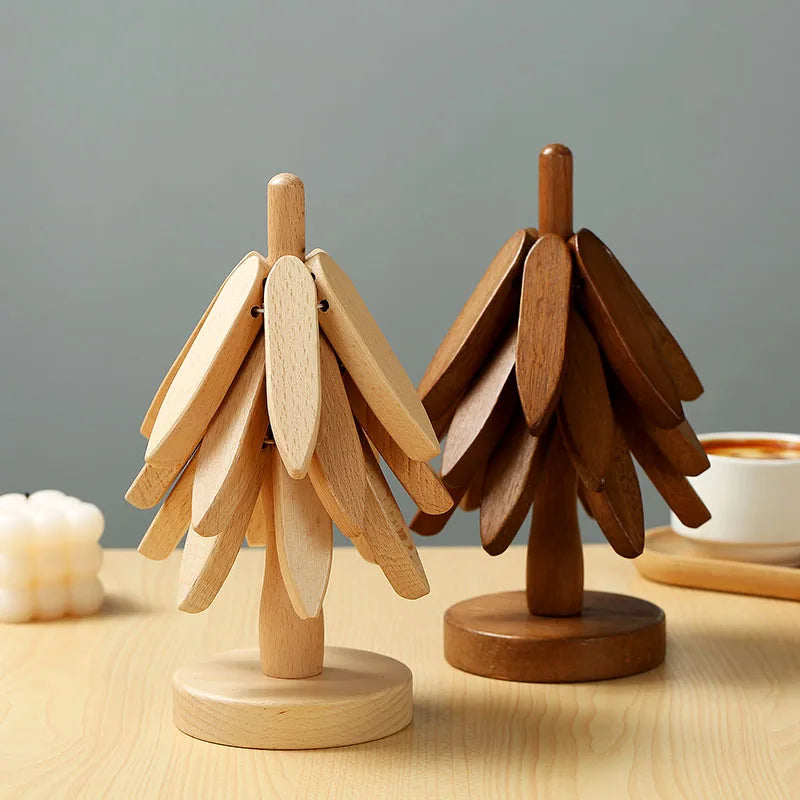 Wooden tree trivet set stacked together on table